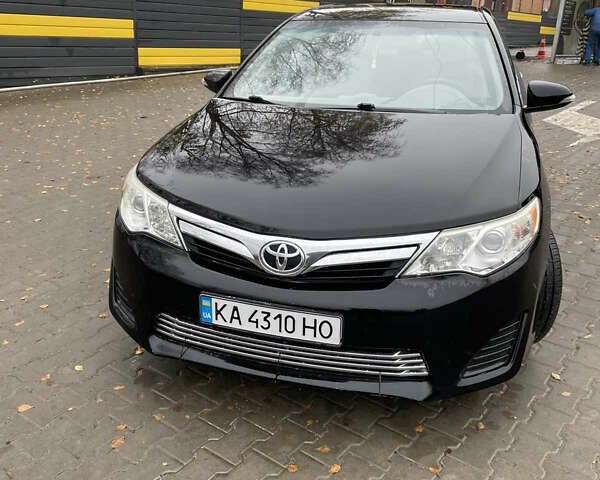 Черный Тойота Камри, объемом двигателя 2.5 л и пробегом 140 тыс. км за 10900 $, фото 2 на Automoto.ua