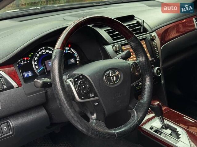Черный Тойота Камри, объемом двигателя 2.5 л и пробегом 257 тыс. км за 13990 $, фото 18 на Automoto.ua