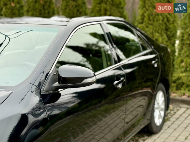 Чорний Тойота Камрі, об'ємом двигуна 2.49 л та пробігом 135 тис. км за 19999 $, фото 21 на Automoto.ua