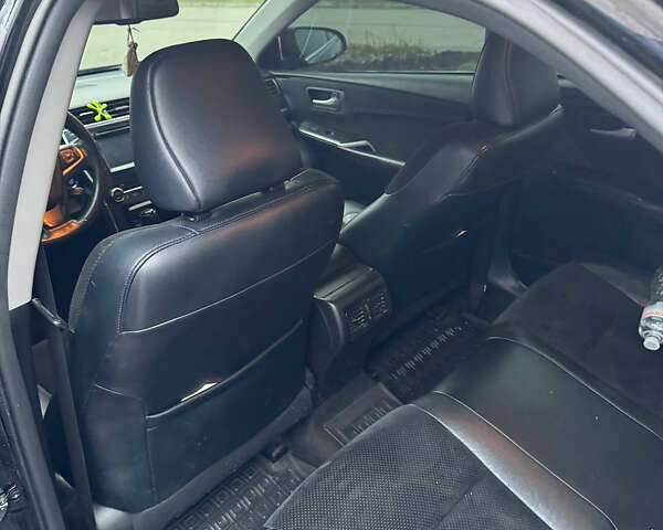 Черный Тойота Камри, объемом двигателя 2.5 л и пробегом 162 тыс. км за 14000 $, фото 3 на Automoto.ua