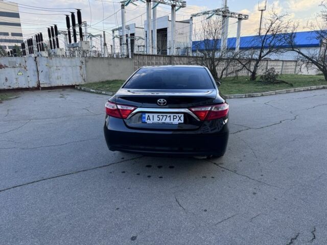 Черный Тойота Камри, объемом двигателя 2.5 л и пробегом 128 тыс. км за 13500 $, фото 1 на Automoto.ua