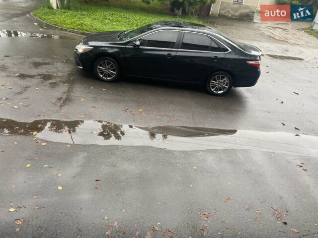 Черный Тойота Камри, объемом двигателя 2.5 л и пробегом 140 тыс. км за 15700 $, фото 18 на Automoto.ua