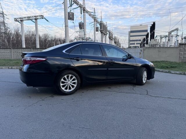 Черный Тойота Камри, объемом двигателя 2.5 л и пробегом 128 тыс. км за 13500 $, фото 2 на Automoto.ua