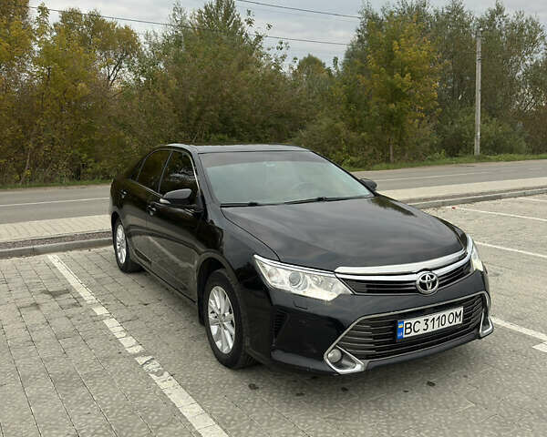 Черный Тойота Камри, объемом двигателя 2.49 л и пробегом 280 тыс. км за 15200 $, фото 1 на Automoto.ua