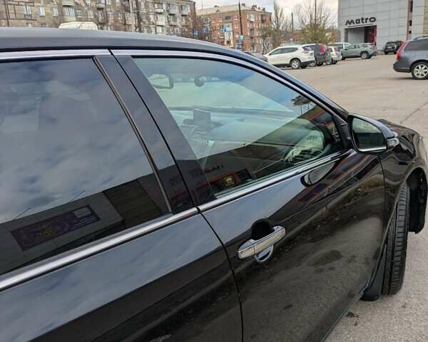 Черный Тойота Камри, объемом двигателя 2.49 л и пробегом 205 тыс. км за 19000 $, фото 4 на Automoto.ua