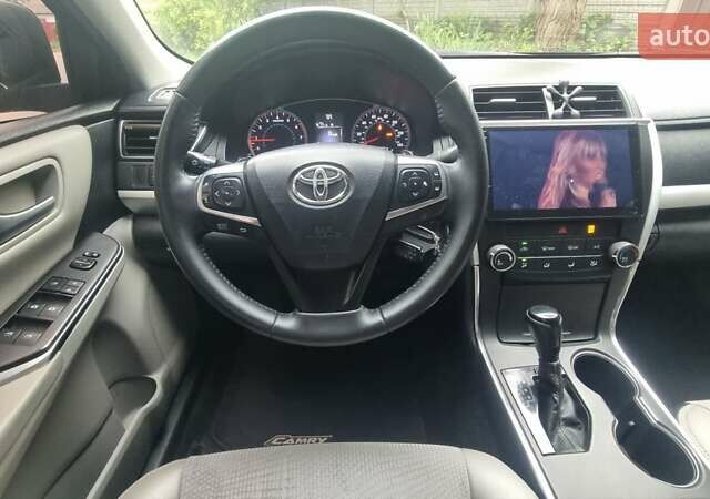 Черный Тойота Камри, объемом двигателя 2.5 л и пробегом 260 тыс. км за 12500 $, фото 1 на Automoto.ua