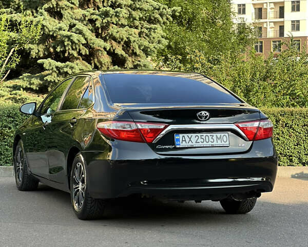 Чорний Тойота Камрі, об'ємом двигуна 2.49 л та пробігом 175 тис. км за 12000 $, фото 3 на Automoto.ua