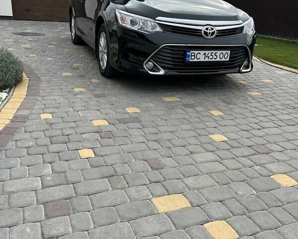 Чорний Тойота Камрі, об'ємом двигуна 2.5 л та пробігом 237 тис. км за 16000 $, фото 1 на Automoto.ua