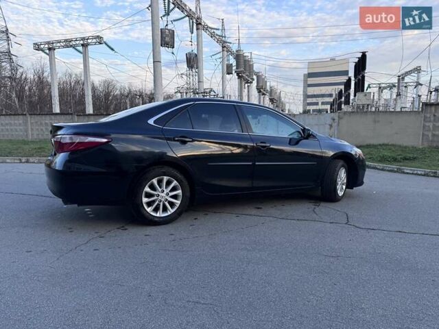 Чорний Тойота Камрі, об'ємом двигуна 2.49 л та пробігом 223 тис. км за 12700 $, фото 4 на Automoto.ua