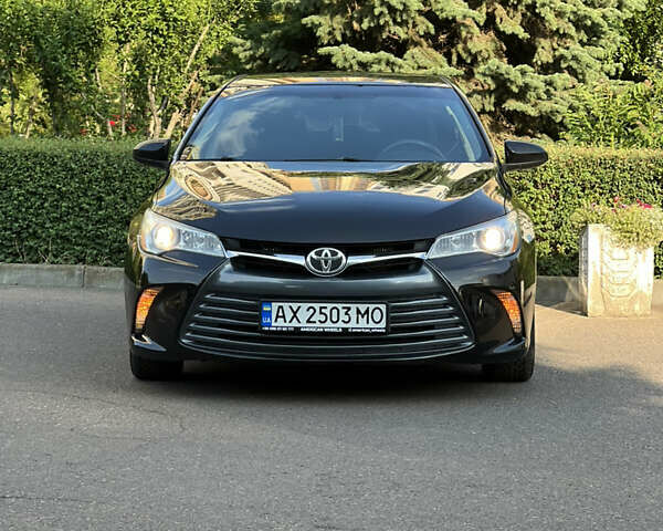 Чорний Тойота Камрі, об'ємом двигуна 2.49 л та пробігом 175 тис. км за 12000 $, фото 1 на Automoto.ua