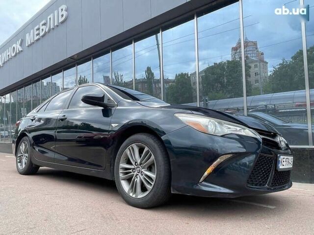 Черный Тойота Камри, объемом двигателя 2.5 л и пробегом 167 тыс. км за 13500 $, фото 28 на Automoto.ua