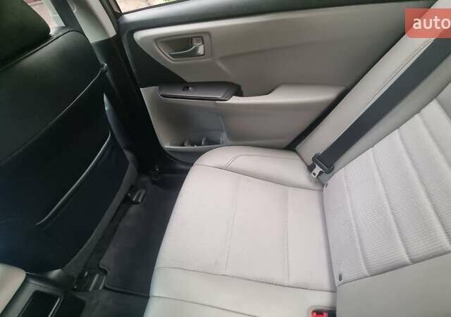 Черный Тойота Камри, объемом двигателя 2.5 л и пробегом 260 тыс. км за 12500 $, фото 25 на Automoto.ua