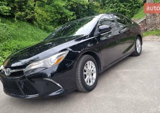 Черный Тойота Камри, объемом двигателя 2.5 л и пробегом 260 тыс. км за 12500 $, фото 4 на Automoto.ua
