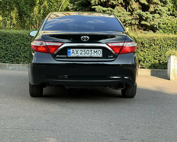 Чорний Тойота Камрі, об'ємом двигуна 2.49 л та пробігом 175 тис. км за 12000 $, фото 4 на Automoto.ua
