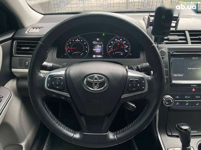 Черный Тойота Камри, объемом двигателя 2.5 л и пробегом 167 тыс. км за 13500 $, фото 19 на Automoto.ua