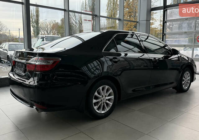 Черный Тойота Камри, объемом двигателя 2.49 л и пробегом 321 тыс. км за 16000 $, фото 3 на Automoto.ua