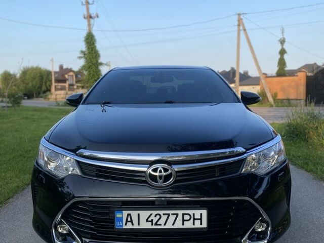 Черный Тойота Камри, объемом двигателя 2.5 л и пробегом 190 тыс. км за 329 $, фото 2 на Automoto.ua