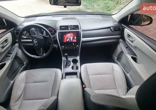 Черный Тойота Камри, объемом двигателя 2.5 л и пробегом 260 тыс. км за 12500 $, фото 18 на Automoto.ua