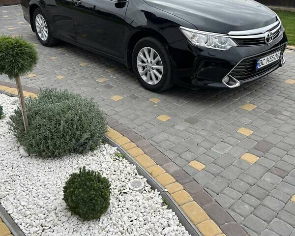 Чорний Тойота Камрі, об'ємом двигуна 2.5 л та пробігом 237 тис. км за 16000 $, фото 2 на Automoto.ua