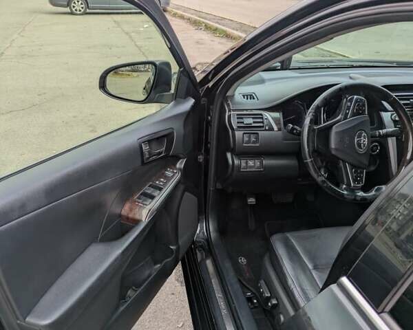 Черный Тойота Камри, объемом двигателя 2.49 л и пробегом 205 тыс. км за 19000 $, фото 15 на Automoto.ua