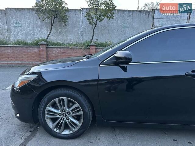 Чорний Тойота Камрі, об'ємом двигуна 2.5 л та пробігом 145 тис. км за 14500 $, фото 2 на Automoto.ua