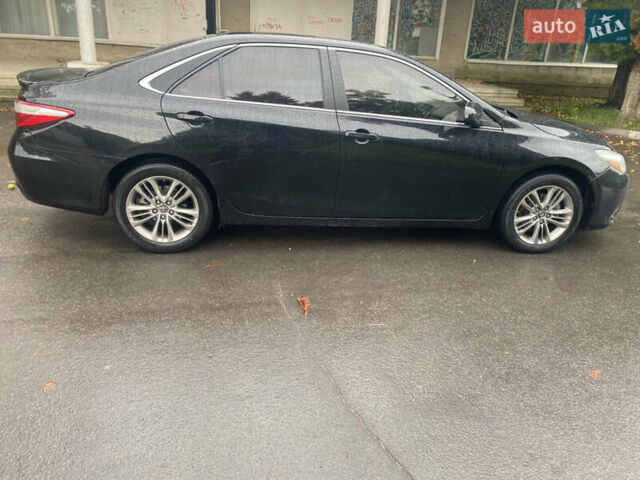 Черный Тойота Камри, объемом двигателя 2.5 л и пробегом 140 тыс. км за 15700 $, фото 5 на Automoto.ua