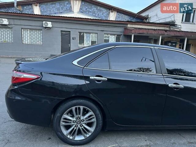 Чорний Тойота Камрі, об'ємом двигуна 2.5 л та пробігом 145 тис. км за 14500 $, фото 5 на Automoto.ua