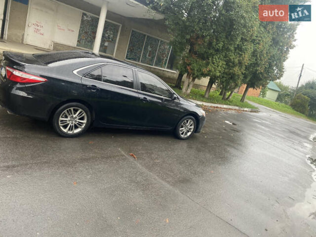 Черный Тойота Камри, объемом двигателя 2.5 л и пробегом 140 тыс. км за 15700 $, фото 4 на Automoto.ua