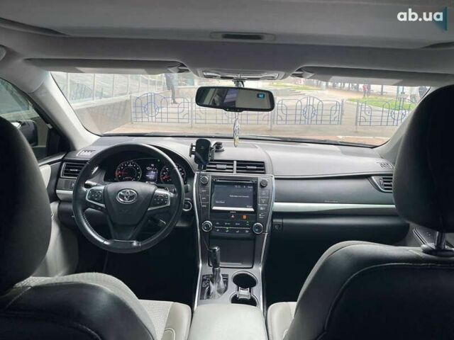 Черный Тойота Камри, объемом двигателя 2.5 л и пробегом 167 тыс. км за 13500 $, фото 22 на Automoto.ua
