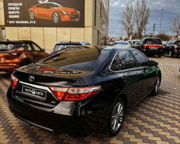 Чорний Тойота Камрі, об'ємом двигуна 2.5 л та пробігом 169 тис. км за 13000 $, фото 3 на Automoto.ua