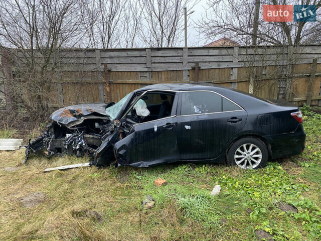 Черный Тойота Камри, объемом двигателя 2.49 л и пробегом 115 тыс. км за 5300 $, фото 1 на Automoto.ua