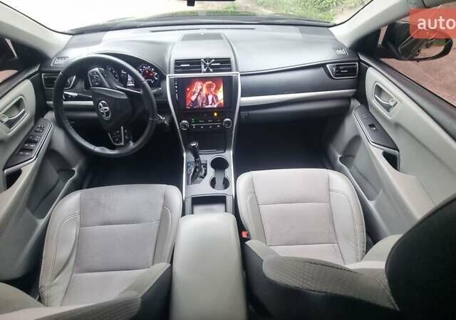 Черный Тойота Камри, объемом двигателя 2.5 л и пробегом 260 тыс. км за 12500 $, фото 17 на Automoto.ua