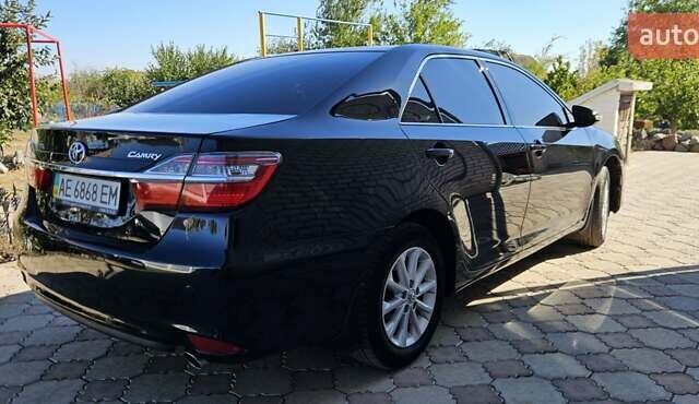Черный Тойота Камри, объемом двигателя 2.49 л и пробегом 167 тыс. км за 17000 $, фото 1 на Automoto.ua