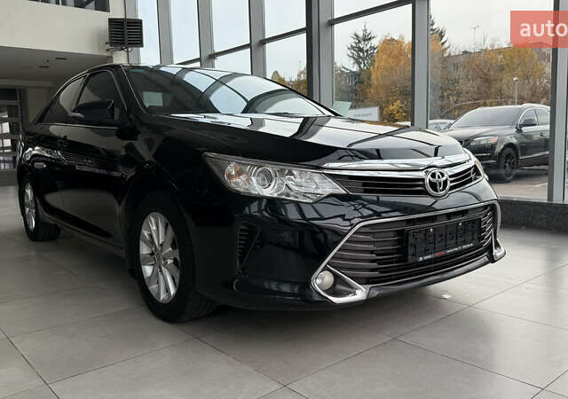 Черный Тойота Камри, объемом двигателя 2.49 л и пробегом 321 тыс. км за 16000 $, фото 1 на Automoto.ua