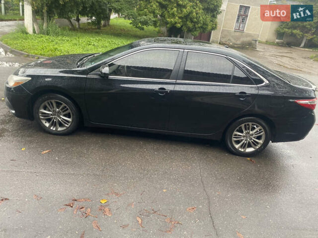 Черный Тойота Камри, объемом двигателя 2.5 л и пробегом 140 тыс. км за 15700 $, фото 8 на Automoto.ua