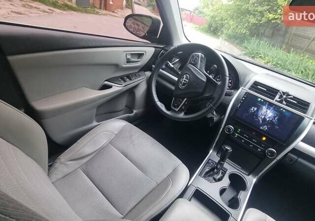 Черный Тойота Камри, объемом двигателя 2.5 л и пробегом 260 тыс. км за 12500 $, фото 3 на Automoto.ua