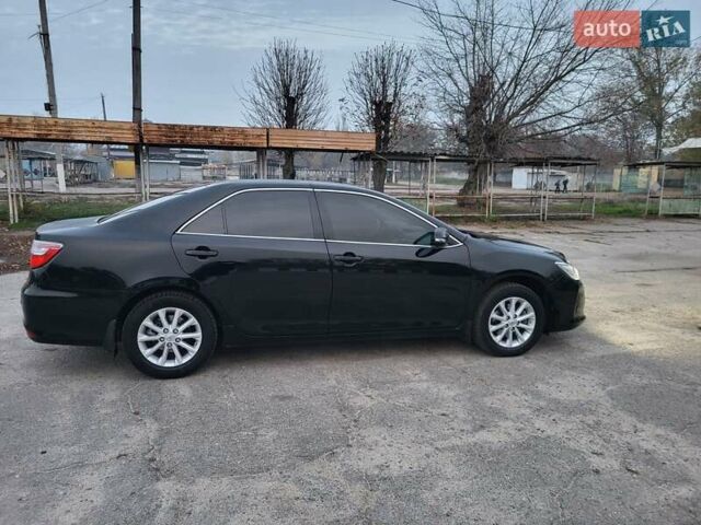 Черный Тойота Камри, объемом двигателя 2.5 л и пробегом 183 тыс. км за 14900 $, фото 2 на Automoto.ua