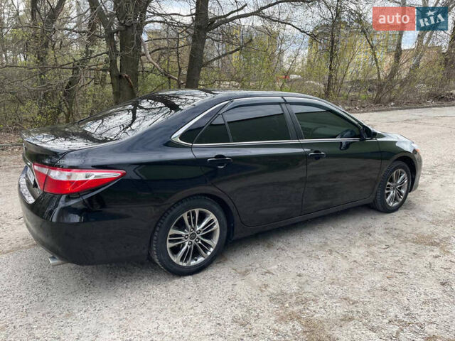 Чорний Тойота Камрі, об'ємом двигуна 2.49 л та пробігом 262 тис. км за 13800 $, фото 10 на Automoto.ua