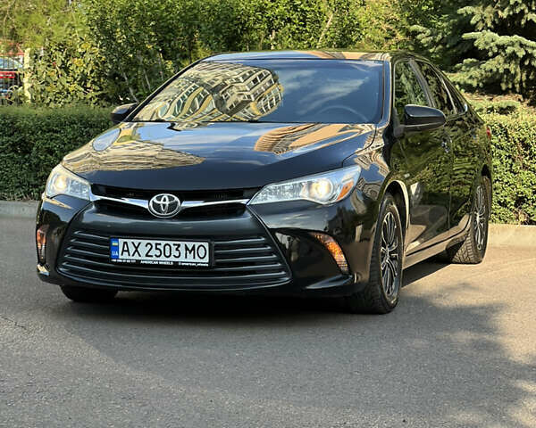 Чорний Тойота Камрі, об'ємом двигуна 2.49 л та пробігом 175 тис. км за 12000 $, фото 2 на Automoto.ua