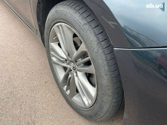 Черный Тойота Камри, объемом двигателя 2.5 л и пробегом 167 тыс. км за 13500 $, фото 11 на Automoto.ua