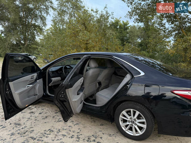 Черный Тойота Камри, объемом двигателя 2.49 л и пробегом 171 тыс. км за 14500 $, фото 4 на Automoto.ua