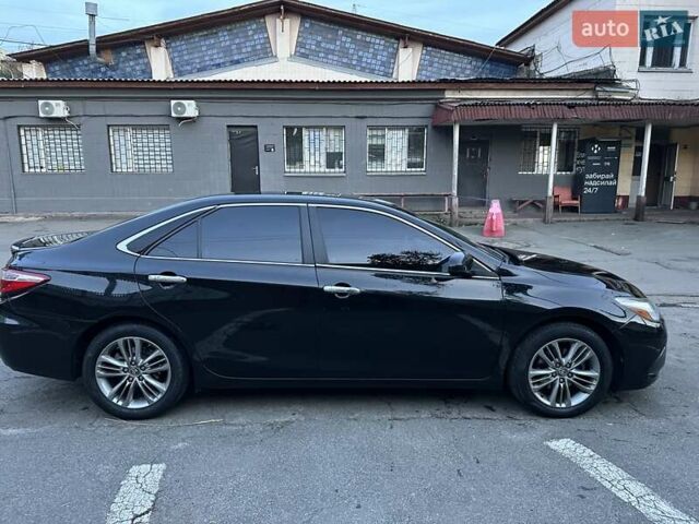 Чорний Тойота Камрі, об'ємом двигуна 2.5 л та пробігом 145 тис. км за 14500 $, фото 6 на Automoto.ua