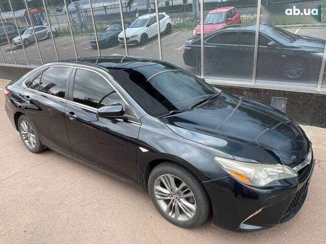 Черный Тойота Камри, объемом двигателя 2.5 л и пробегом 167 тыс. км за 13500 $, фото 29 на Automoto.ua