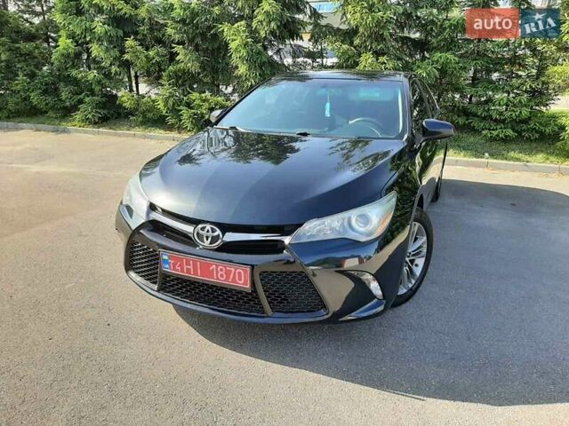 Черный Тойота Камри, объемом двигателя 2.49 л и пробегом 231 тыс. км за 12200 $, фото 19 на Automoto.ua