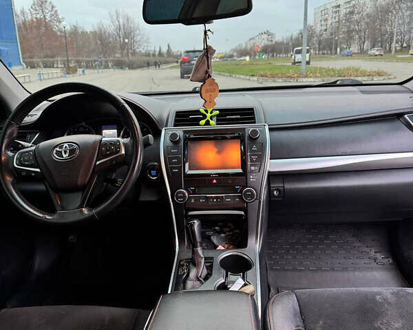 Черный Тойота Камри, объемом двигателя 2.5 л и пробегом 162 тыс. км за 14000 $, фото 6 на Automoto.ua