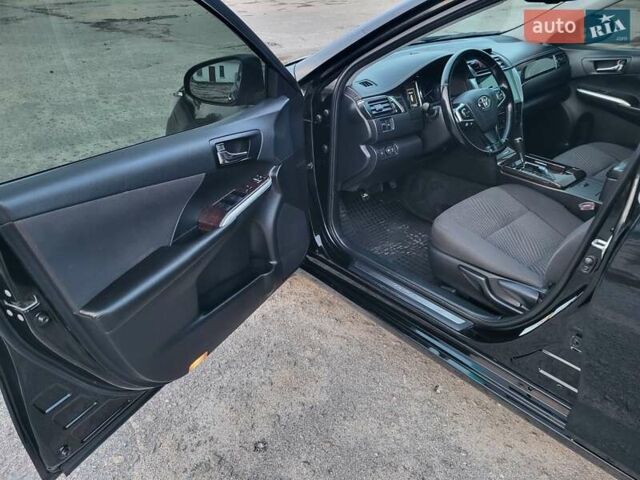 Черный Тойота Камри, объемом двигателя 2.5 л и пробегом 183 тыс. км за 14900 $, фото 6 на Automoto.ua