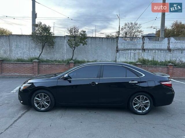 Чорний Тойота Камрі, об'ємом двигуна 2.5 л та пробігом 145 тис. км за 14500 $, фото 1 на Automoto.ua