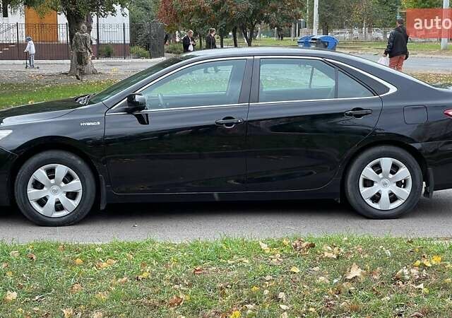 Черный Тойота Камри, объемом двигателя 2.5 л и пробегом 205 тыс. км за 12500 $, фото 1 на Automoto.ua