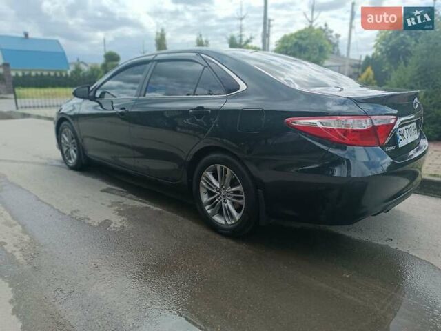 Черный Тойота Камри, объемом двигателя 2.5 л и пробегом 174 тыс. км за 14500 $, фото 2 на Automoto.ua