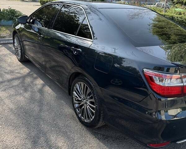 Черный Тойота Камри, объемом двигателя 2.49 л и пробегом 127 тыс. км за 18100 $, фото 35 на Automoto.ua